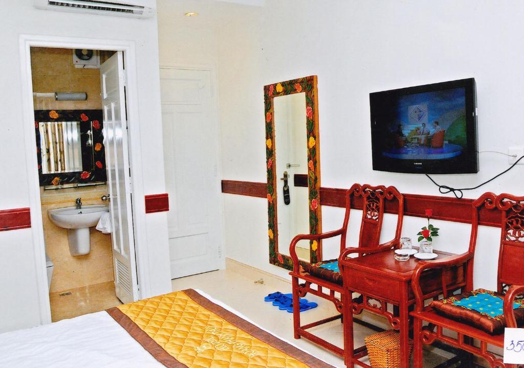 Hoang Thanh Thuy Airport Hotel 1 - Gan Am Thuc Dem Cho Hoang Hoa Tham Ciudad Ho Chi Minh  Habitación foto